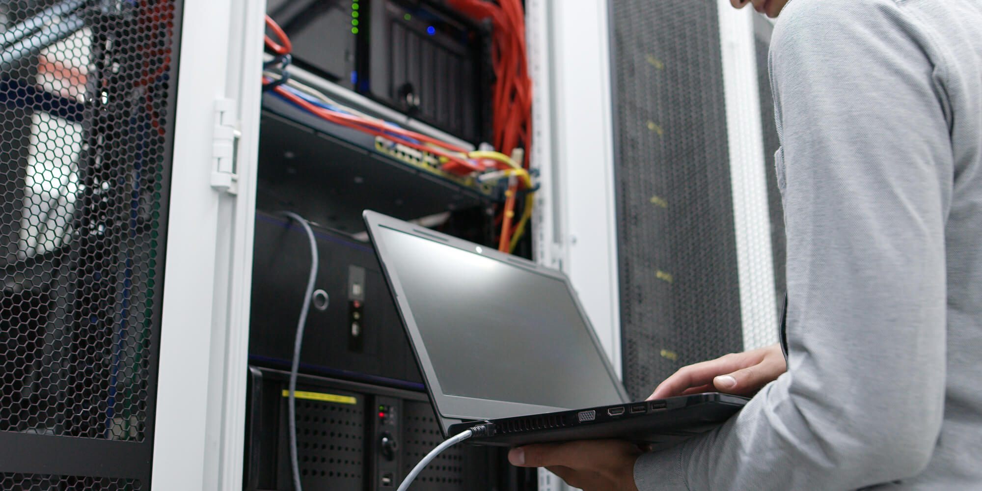 IT expert checking supercomputer server