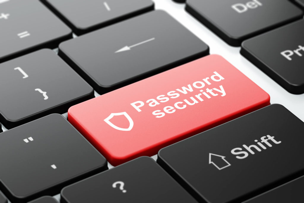 Contoured Shield and Password Security on computer keyboard background