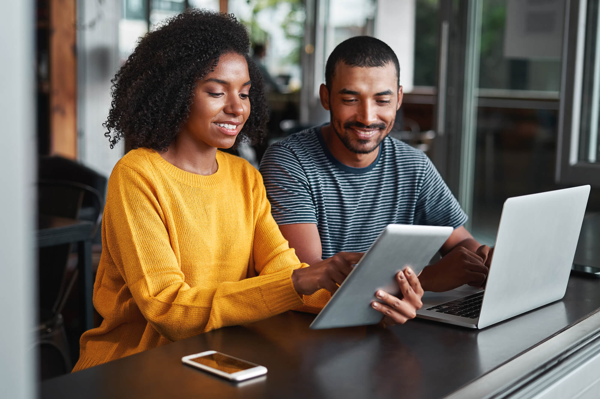 two remote employees working in it services in palm beach county